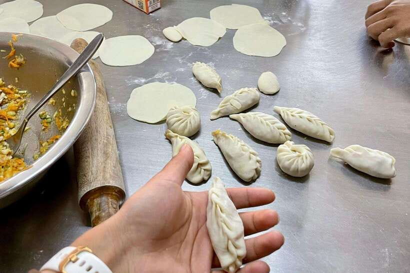 Kathmandu: Traditional Momo Making Class & Pickup - Kathmandu Cooking Academy and the 1 PM timing reality